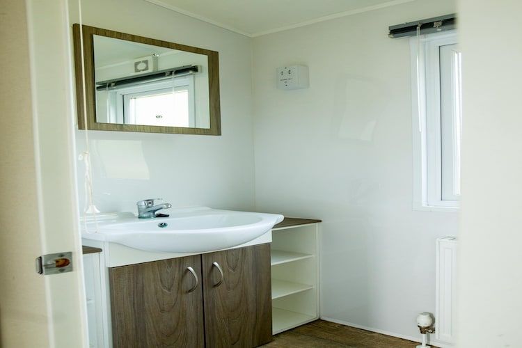 De badkamer van Recreatiepark Duinhoeve 11 in Udenhout