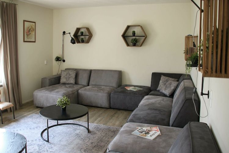 De woonkamer van Recreatiepark de Boshoek 17 in Voorthuizen