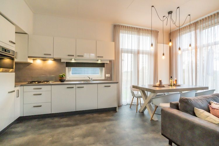 De woonkamer van Vakantiepark Mölke 19 in Zuna